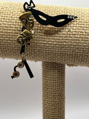 Black Enamel Masquerade Mask Dangle Brooch with Gold Theater Charms